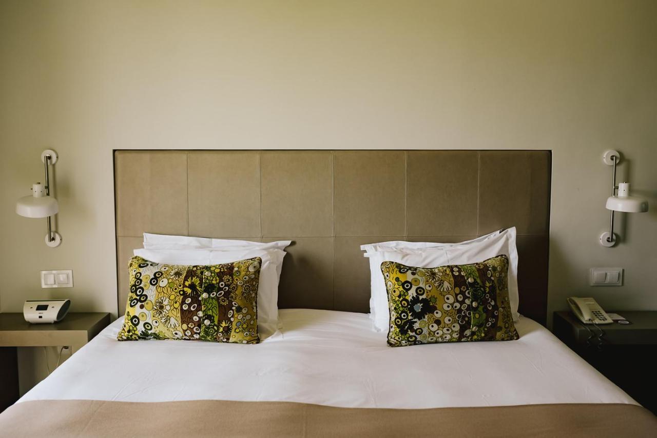 Готель M'Ar De Ar Aqueduto Евора Екстер'єр фото A bed with a headboard